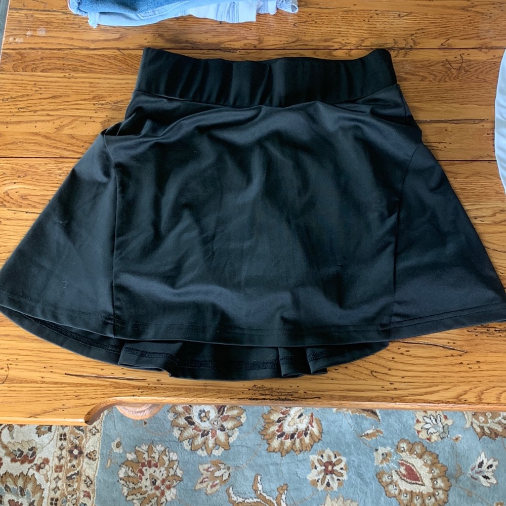 Black pleated skort